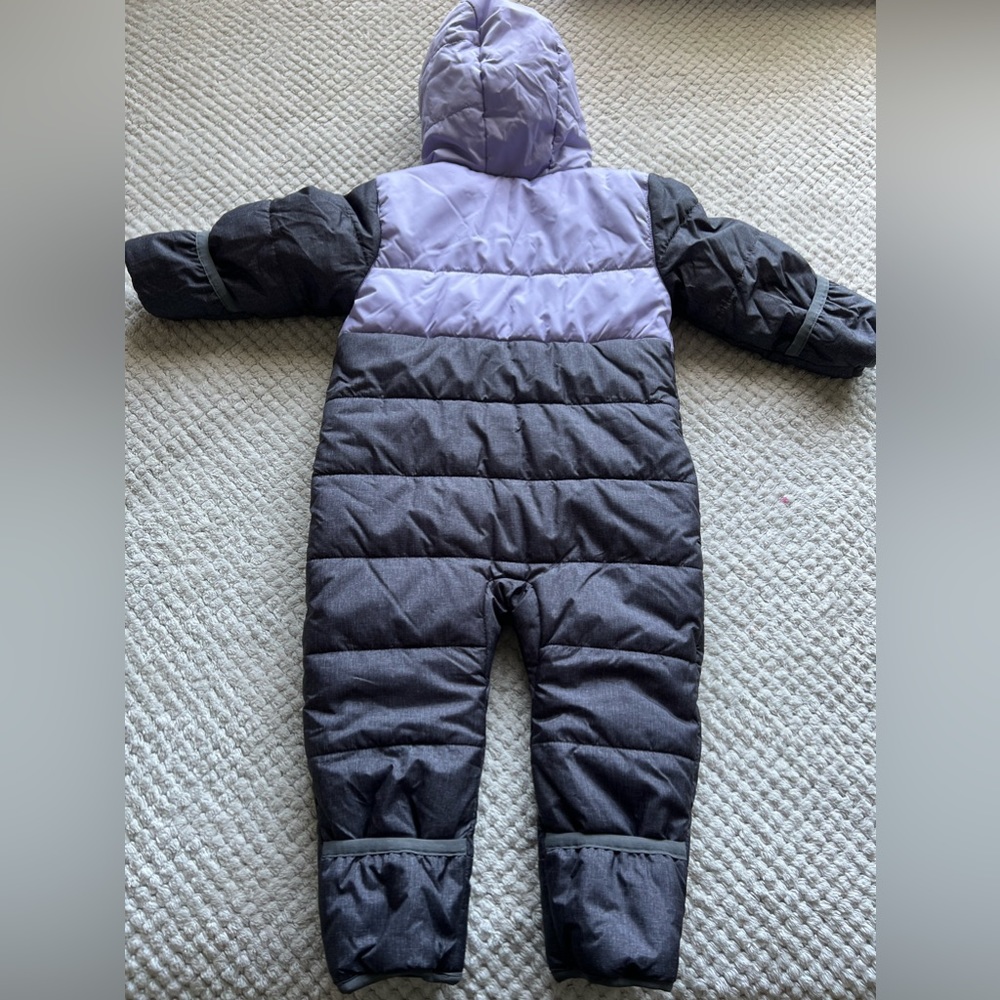 Snowsuit comes with the option to cover hands and feet